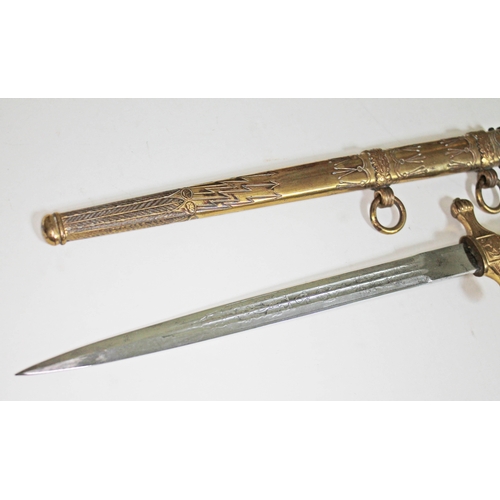 393 - A German WWII Third Reich Kriegsmarine dagger, wire bound plastic grip with gilt brass swastika and ... 