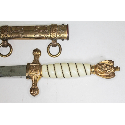 393 - A German WWII Third Reich Kriegsmarine dagger, wire bound plastic grip with gilt brass swastika and ... 