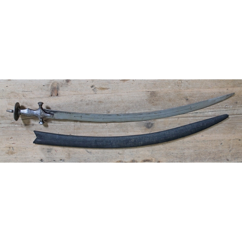 415 - An 18th/19th century Indian tulwar sword with decorated hilt and later scabbard, blade length 70cm.