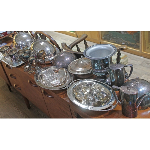 439 - A quantity of silver plated ware including a champagne bucket, tureens, goblets etc.