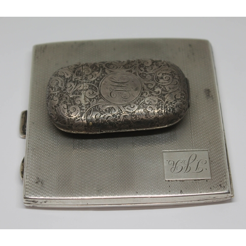 483 - A hallmarked silver Art Deco style cigarette case and a hallmarked silver vesta case, wt. 4oz.