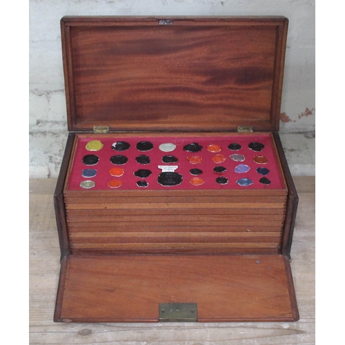 490 - A Georgian mahogany specimen box housing an extensive collection of wax intaglio seal impressions, e... 