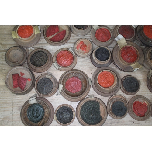 491 - A quantity of wax intaglio seal impressions, medieval 13th century and later, each contained in tree... 