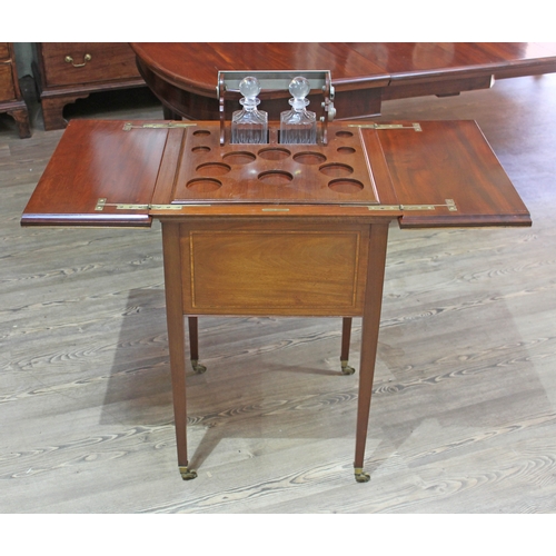 88E - An Edwardian mahogany metamorphic drinks cabinet/table, inlaid with rosewood, boxwood and tulip, tap... 