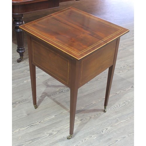 88E - An Edwardian mahogany metamorphic drinks cabinet/table, inlaid with rosewood, boxwood and tulip, tap... 