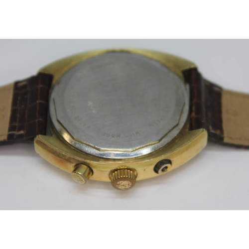 139 - A vintage gold plated Avia Olympic chronograph wristwatch with signed black dial, gold and white hou... 