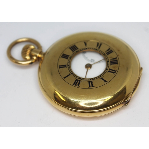 154 - A hallmarked 18ct gold half hunter pocket watch, the white enamel dial having Roman numerals and sec... 