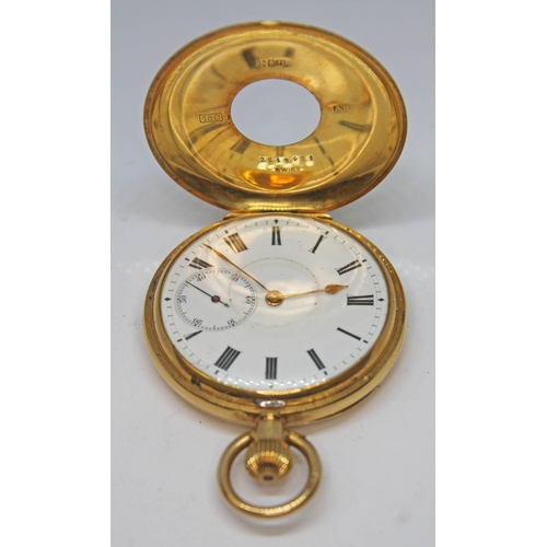 154 - A hallmarked 18ct gold half hunter pocket watch, the white enamel dial having Roman numerals and sec... 