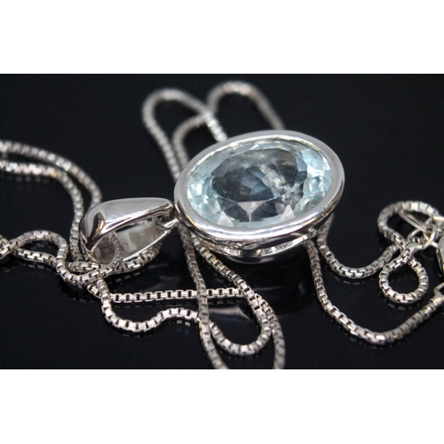 170 - An aquamarine pendant, the bezel set oval cut stone meauring approx. 19mm x 10mm x 6mm, both pendant... 