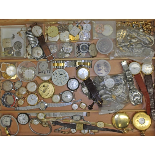 115 - A wooden tray of mixed wristwatch and pocket watches for spares and repairs with additional movement... 