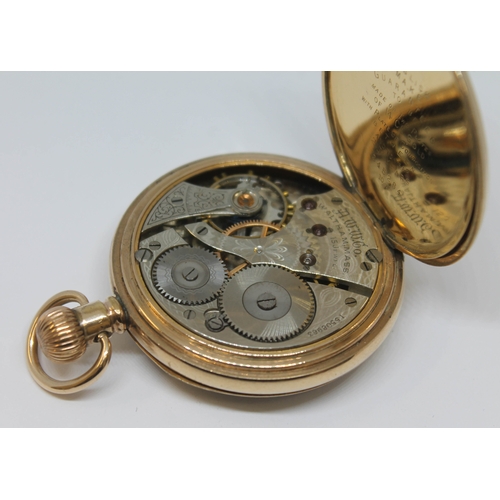 119 - A gold plated Waltham open face pocket watch with white enamel dial, Roman numerals and spade hands ... 