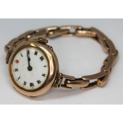 136 - An early 20th century ladies 9ct gold wristwatch with sprung strap marked '9ct', having Roman numera... 