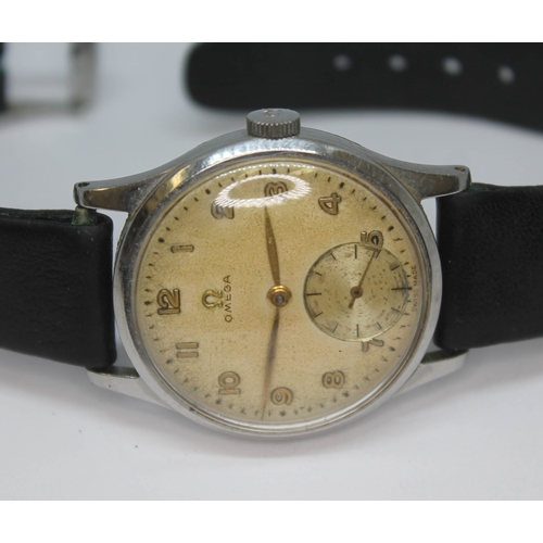 141 - A 1947 stainless steel Omega 13322, with signed tropical dial, Arabic numerals and hands in gold and... 