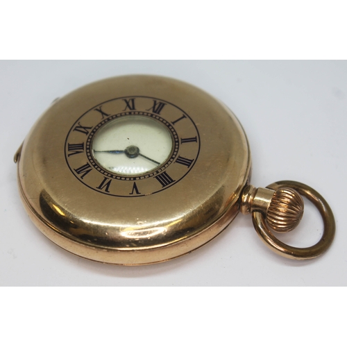 151 - A gold plated half hunter pocket watch in Dennison case, the dial and movement unsigned, case refere... 