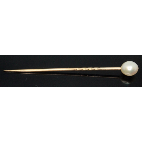 166 - A natural pearl stick pin circa 1900, the oval beaded pearl measuring approx. 7.98mm x 6.92mm, yello... 