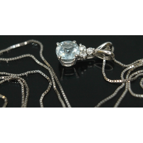 169 - An Italian diamond and aquamarine pendant, the round brilliant cut aquamarine diam. approx. 6mm and ... 