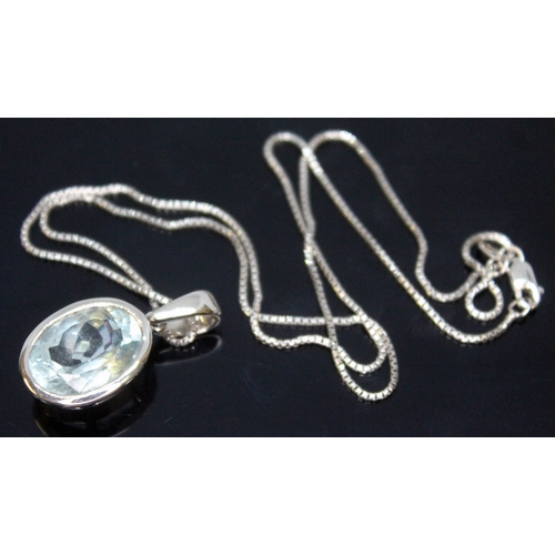 170 - An aquamarine pendant, the bezel set oval cut stone meauring approx. 19mm x 10mm x 6mm, both pendant... 