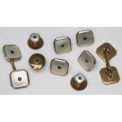 172 - An Art Deco 9ct gold buttong and cufflink set, each set with mother of pearl and a central sapphire,... 