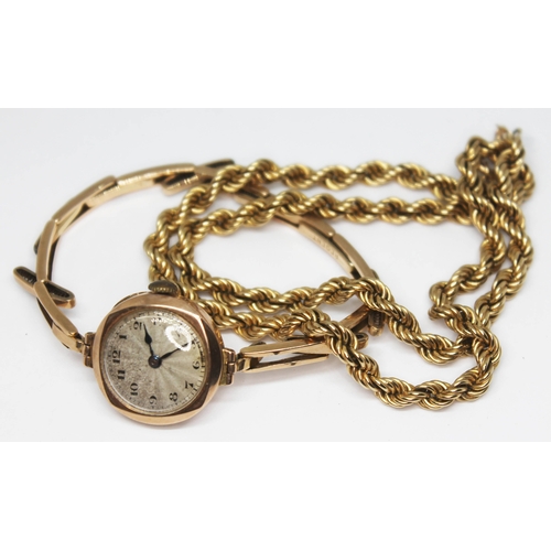 222 - A hallmarked 9ct gold wristwatch with sprung strap marked '9ct' together with a twist link chain mar... 