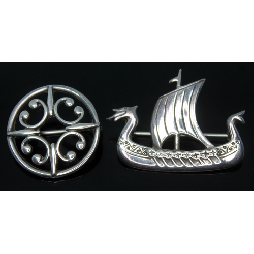 231 - Two modern Scottish Celtic style silver brooches by Ola M Gorie, one fromed as a Viking ship, length... 