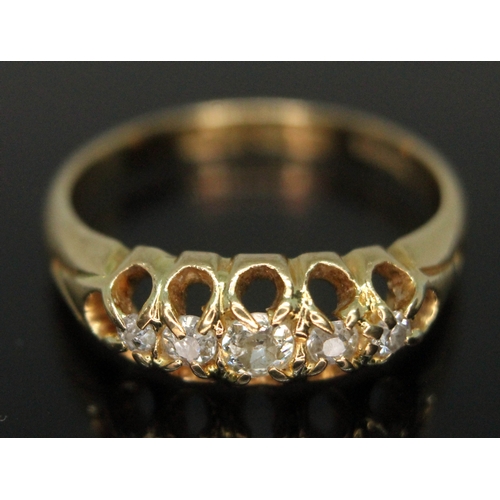 247 - A hallmarked 18ct gold diamond ring, gross wt. 3.87g, size M.