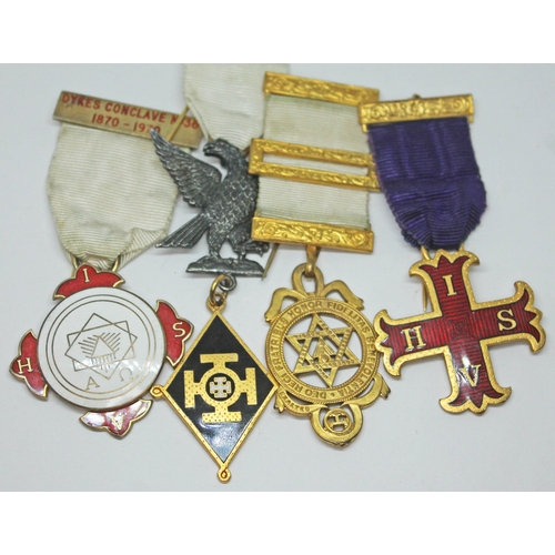 256 - A hallmarked silver gilt Masonic type medal and three others.