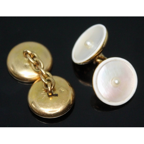 259 - A pair of mother of pearl and cultured pearl set cufflinks, marked '18', gross wt. 8.01g, with fitte... 