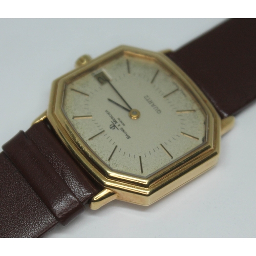 293 - A gents hallmarked 18ct gold Baume & Mercier quartz wristwatch with leather strap, tank style case w... 