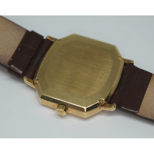 293 - A gents hallmarked 18ct gold Baume & Mercier quartz wristwatch with leather strap, tank style case w... 