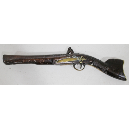 414 - A flintlock blunderbuss pistol, the plate marked 'Rossi', length 49cm.