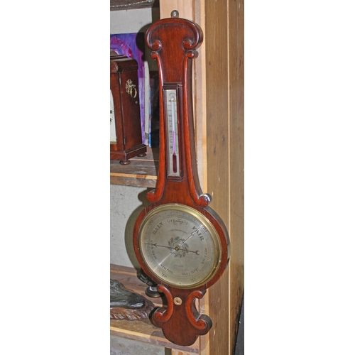 51 - A 19th century mahogany barometer, length 102cm.