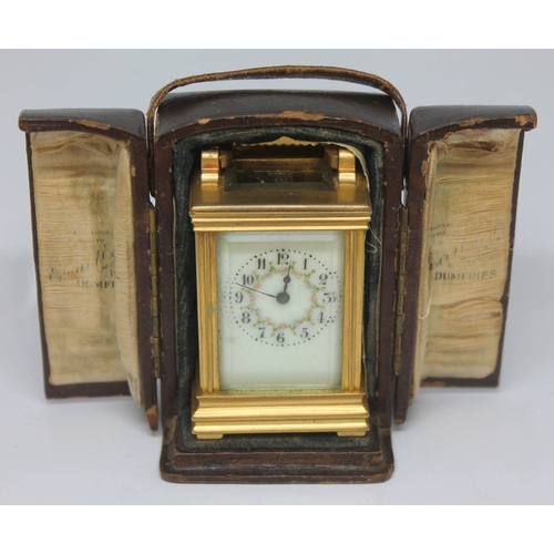 57 - A French miniature carriage clock, height 7.5cm, with case.