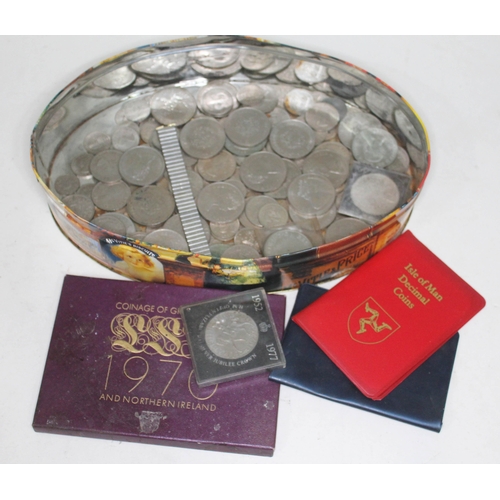 93 - A tin of various coins.