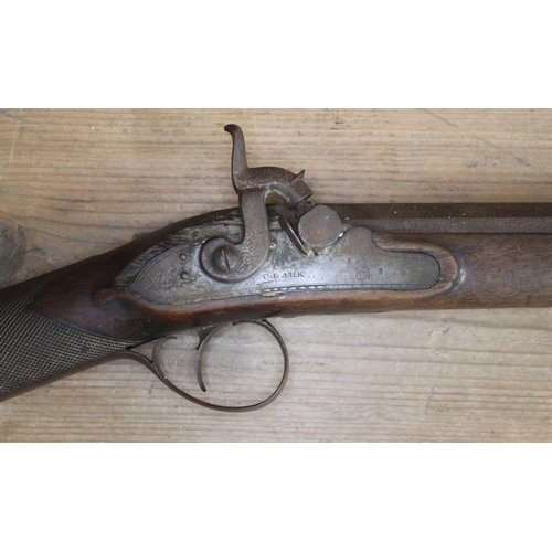 442 - A 19th century percussion musket, marked 'Clark London', length 124cm.