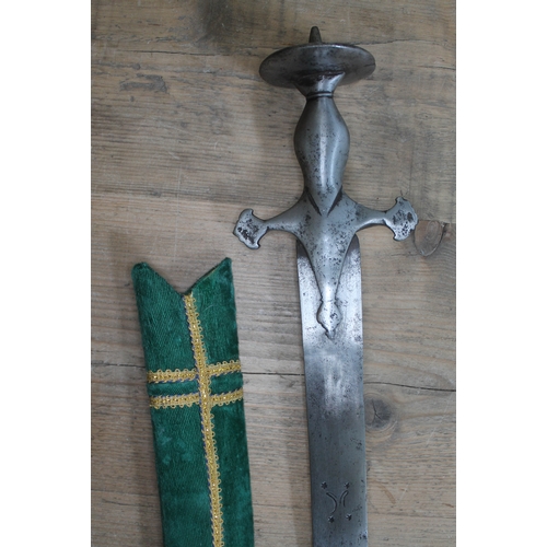 447 - An 18th/19th century North Indian Mughal cavalry sword with green scabbard, total length 97cm.