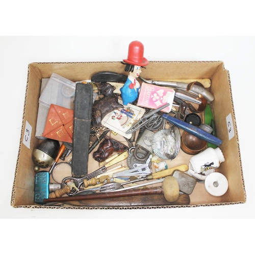 458 - A box of bric a brac including pipes, a cut throat razor, treen, metalware etc.