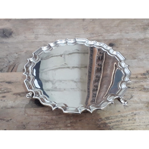 100E - A hallmarked silver salver, Sheffield 1933, wt. 11oz.