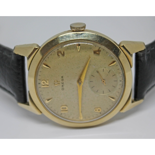 118 - A 1952 gold plated Omega wristwatch with gold tone signed dial, alternate Roman numerals and hour ba... 