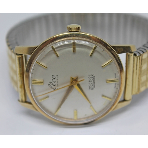 122 - A 1960s hallmarked 9ct gold Elco wristwatch with signed champagne dial, gold tone hour markers and d... 