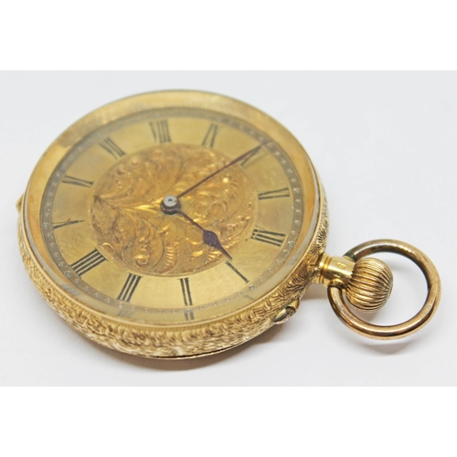 135 - A ladies pocket watch marked 18k with engraved central design to dial, Roman numerals and spade hand... 