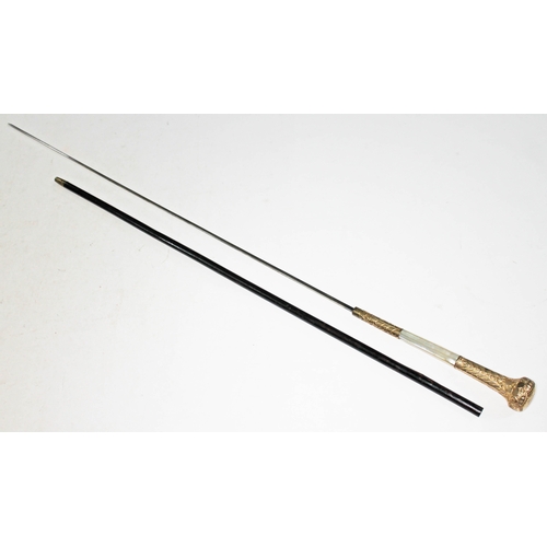 299 - A sword stick with yellow metal and mother of pearl handle, blade length 68cm, total length 93cm.