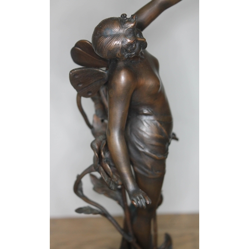 313 - Franz Rosse (1858-1900), Art Nouveau bronze depicting a semi nude female pixie stood with left arm r... 