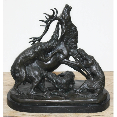 314 - A bronze sculpture depicting three wolves attacking a stag, signed 'G Gardet', on marble base, heigh... 