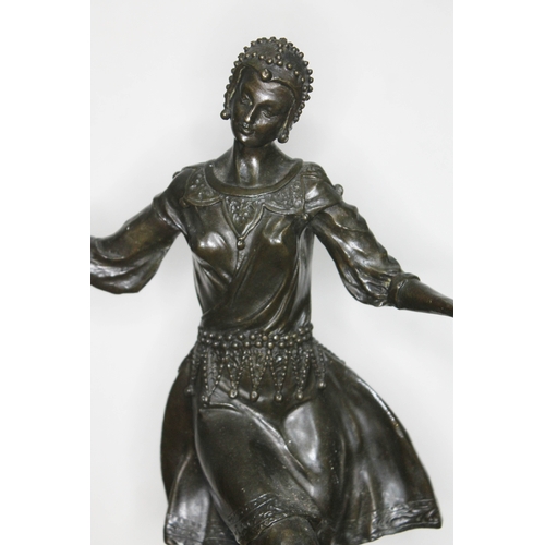 319 - An Art Deco style bronze figure depicting a lady dancing on square marble base, signed 'Descomps' an... 