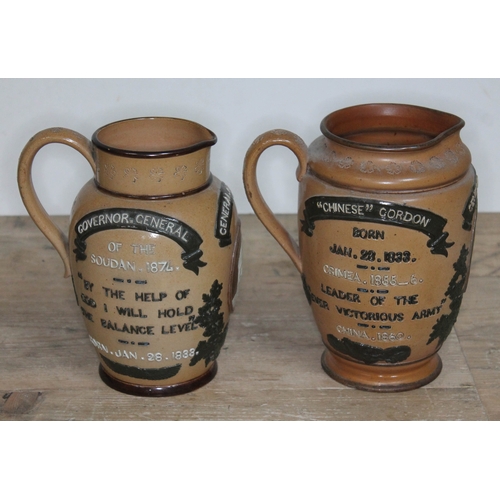 322 - A matched pair of Doulton Lambeth General Gordon Commemorative stoneware jugs, heights 18.5cm & 19.5... 