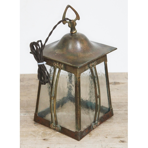 326 - An Edwardian Arts & Crafts copper lantern light fitting, height 34cm.