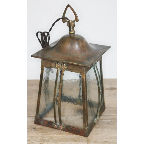 326 - An Edwardian Arts & Crafts copper lantern light fitting, height 34cm.