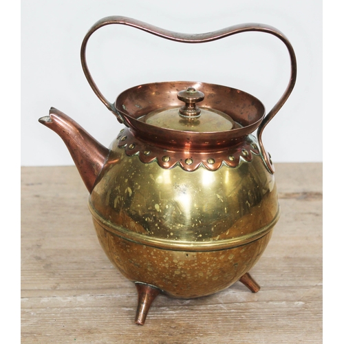 328 - A copper and brass teapot designed by Christopher Dresser for Benham & Froud, unmarked, height 22cm.... 