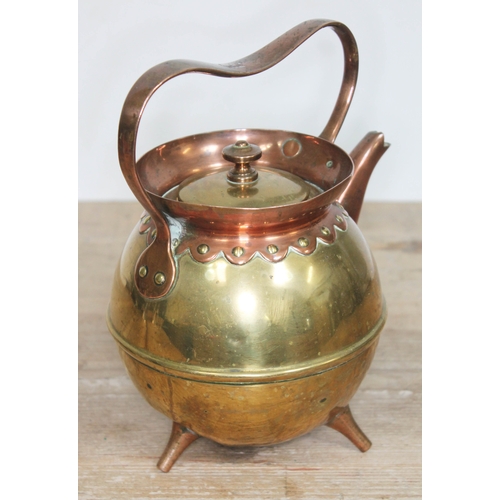 328 - A copper and brass teapot designed by Christopher Dresser for Benham & Froud, unmarked, height 22cm.... 