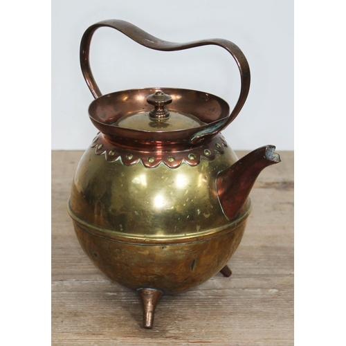 328 - A copper and brass teapot designed by Christopher Dresser for Benham & Froud, unmarked, height 22cm.... 